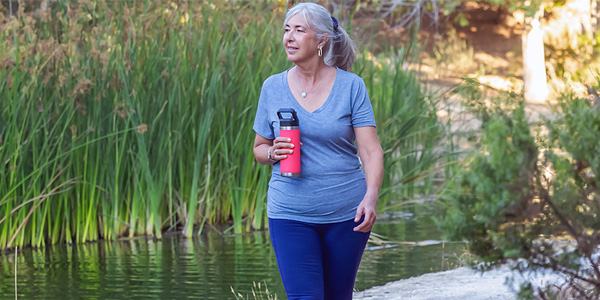 Woman walking outdoors
